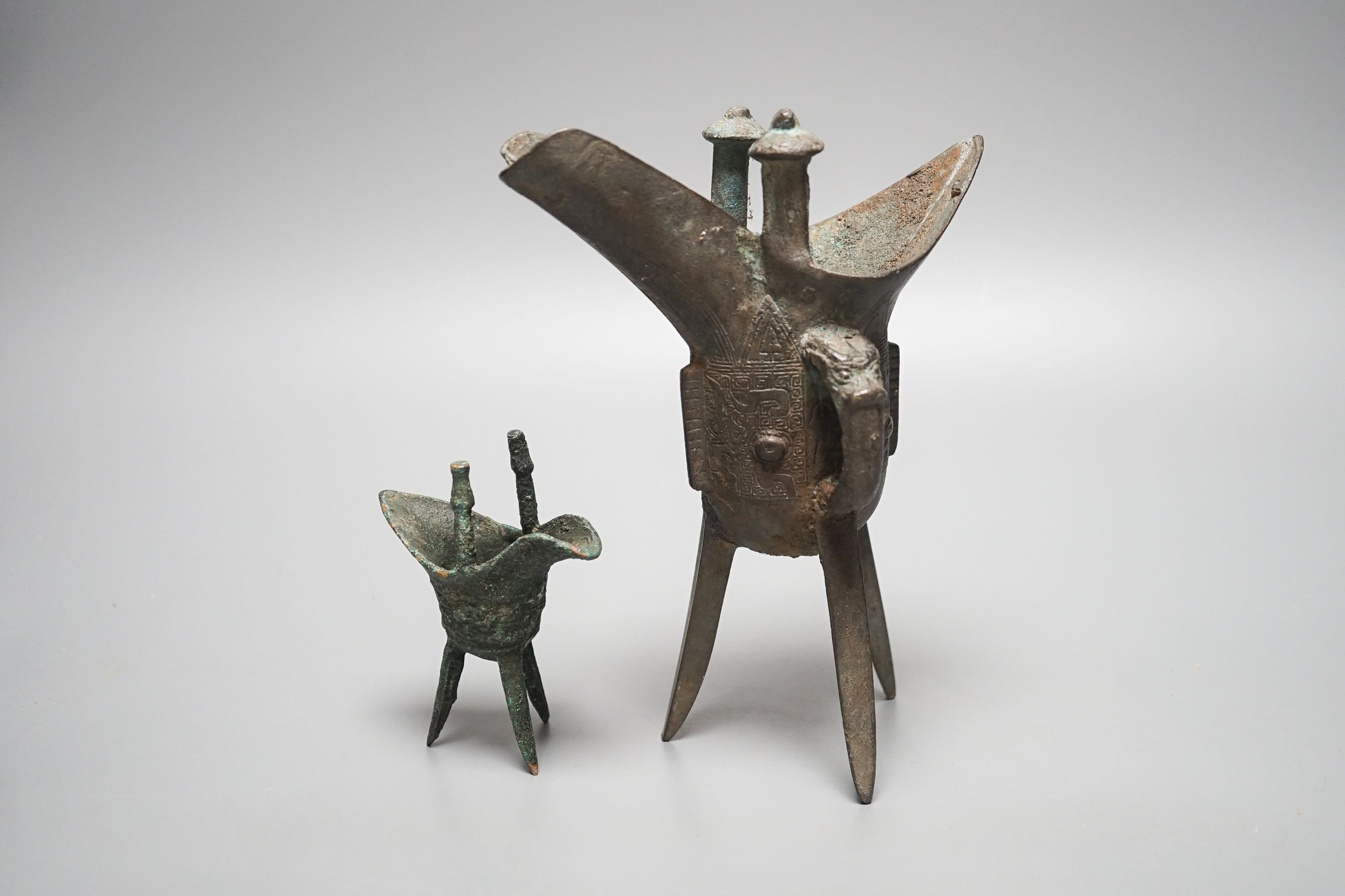 Two Chinese bronze tripod vessels, Qing or later, tallest 19cm